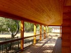 First things first, wonderful country living on a 2100 square foot wraparound covered porch.